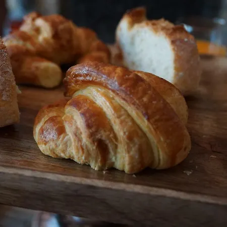 Quatre Saisons Frühstückspension *
